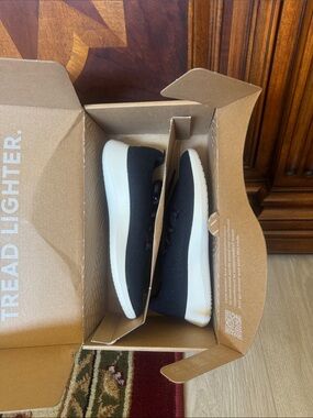 Allbirds Black Slip-On Wool Sneakers with White Sole